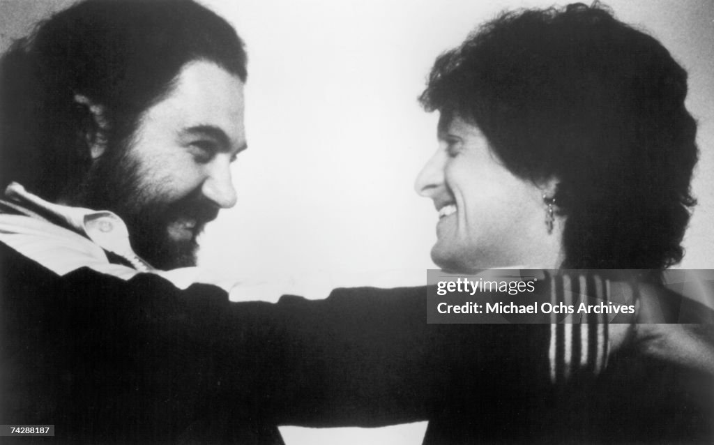 Demis Roussos with a companion